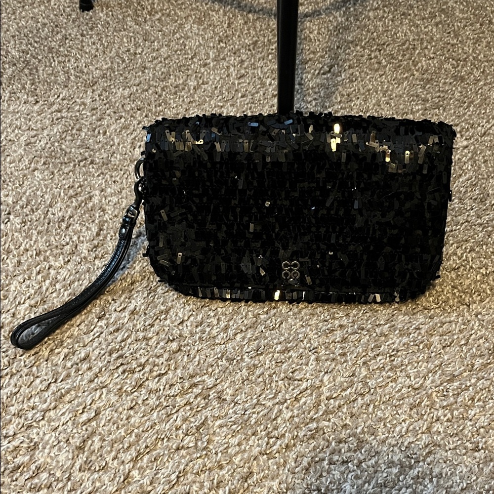 Like new coach clutch